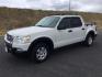 2009 White Suede Clearcoat Ford Explorer Sport Trac XLT (1FMEU51E89U) with an 4L V-6 regular unleaded engine, located at 1801 Main Street, Lewiston, 83501, (208) 743-9371, 46.417065, -117.004799 - Photo#1
