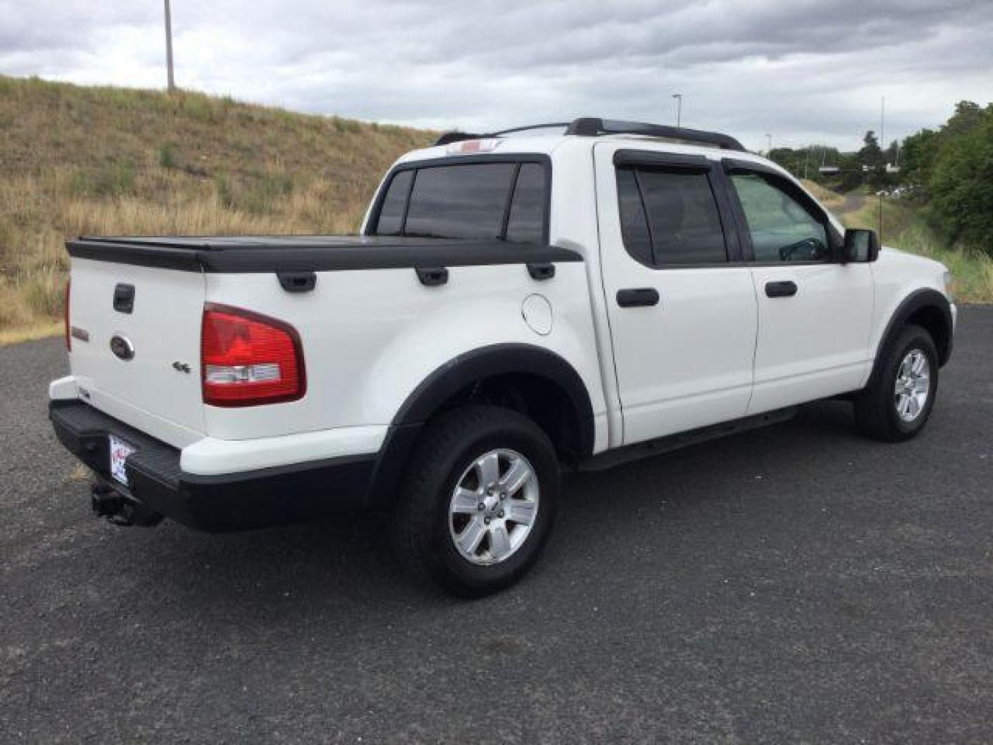 2009 White Suede Clearcoat Ford Explorer Sport Trac XLT (1FMEU51E89U) with an 4L V-6 regular unleaded engine, located at 1801 Main Street, Lewiston, 83501, (208) 743-9371, 46.417065, -117.004799 - Photo#8
