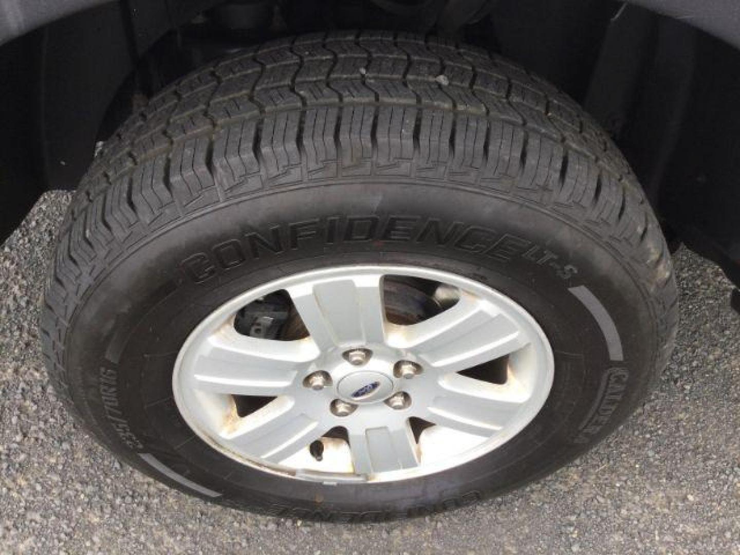 2009 White Suede Clearcoat Ford Explorer Sport Trac XLT (1FMEU51E89U) with an 4L V-6 regular unleaded engine, located at 1801 Main Street, Lewiston, 83501, (208) 743-9371, 46.417065, -117.004799 - Photo#11