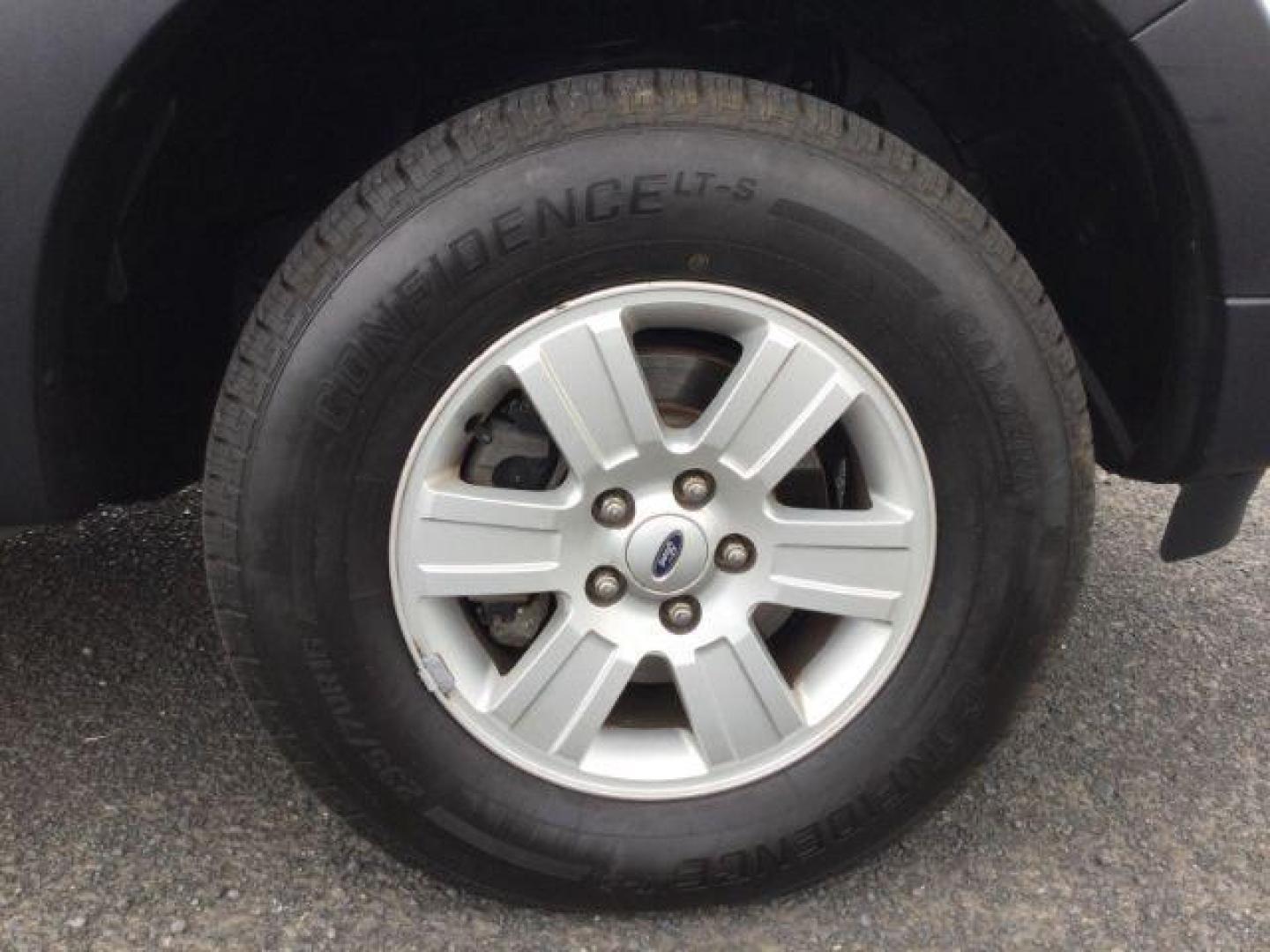 2009 White Suede Clearcoat Ford Explorer Sport Trac XLT (1FMEU51E89U) with an 4L V-6 regular unleaded engine, located at 1801 Main Street, Lewiston, 83501, (208) 743-9371, 46.417065, -117.004799 - Photo#14