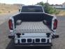 2023 Summit White /Jet Black GMC Sierra 2500HD SLT (1GT49NEY4PF) with an Duramax 6.6L V-8 diesel direct injection engine, 10 speed automatic transmission, located at 1801 Main Street, Lewiston, 83501, (208) 743-9371, 46.417065, -117.004799- Photo#9