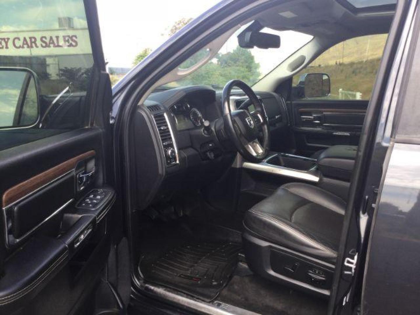 2017 Maximum Steel Metallic Clearcoat /Black Ram 2500 Laramie Crew Cab 4x4 6'4 Box (3C6UR5FL8HG) with an Cummins 6.7L I-6 diesel direct injection engine, 6-Speed Automatic transmission, located at 1801 Main Street, Lewiston, 83501, (208) 743-9371, 46.417065, -117.004799 - Photo#3