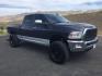 2017 Maximum Steel Metallic Clearcoat /Black Ram 2500 Laramie Crew Cab 4x4 6'4 Box (3C6UR5FL8HG) with an Cummins 6.7L I-6 diesel direct injection engine, 6-Speed Automatic transmission, located at 1801 Main Street, Lewiston, 83501, (208) 743-9371, 46.417065, -117.004799 - Photo#4