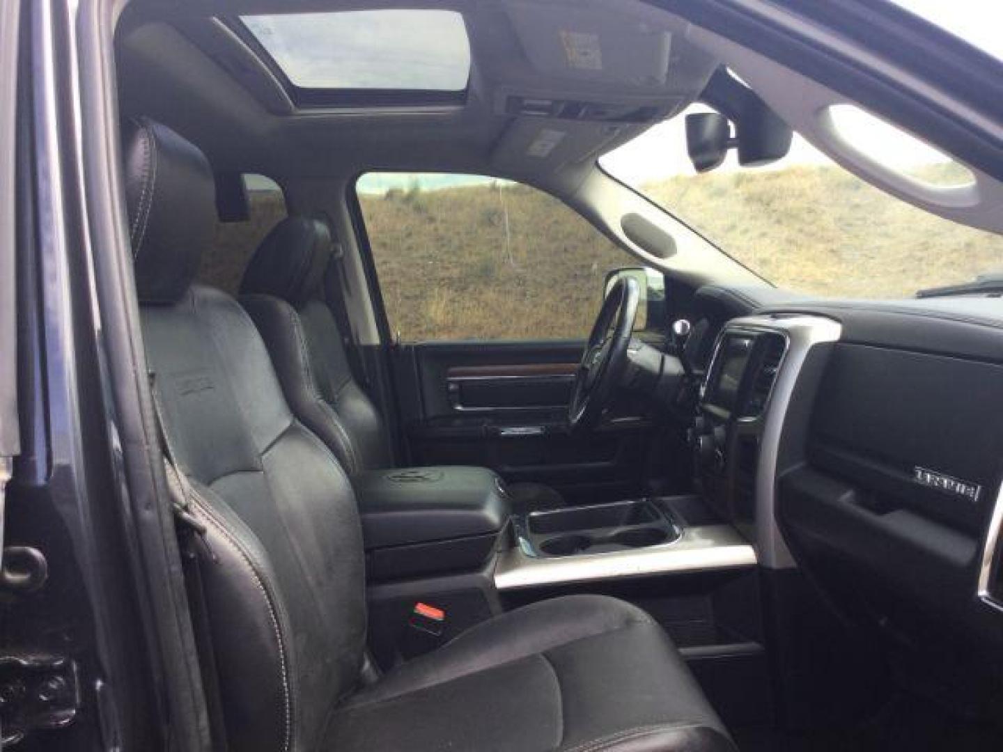 2017 Maximum Steel Metallic Clearcoat /Black Ram 2500 Laramie Crew Cab 4x4 6'4 Box (3C6UR5FL8HG) with an Cummins 6.7L I-6 diesel direct injection engine, 6-Speed Automatic transmission, located at 1801 Main Street, Lewiston, 83501, (208) 743-9371, 46.417065, -117.004799 - Photo#7