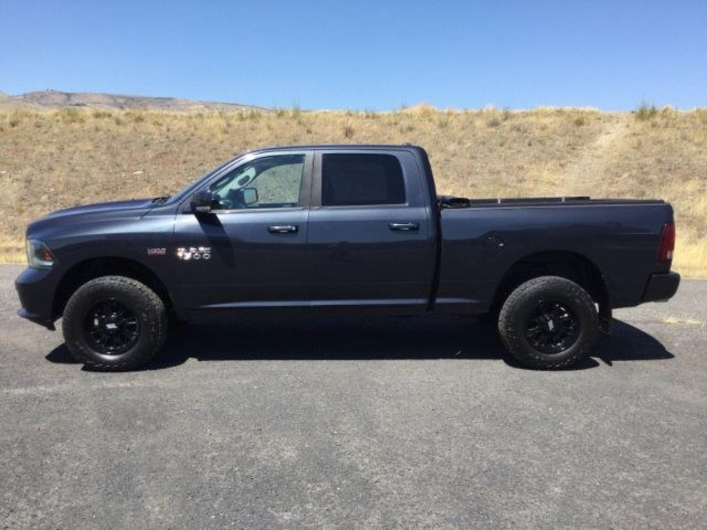 2015 Maximum Steel Metallic /Black Ram 1500 Sport (1C6RR7UT4FS) with an HEMI 5.7L V-8 variable valve control engine, 8 Speed Automatic transmission, located at 1801 Main Street, Lewiston, 83501, (208) 743-9371, 46.417065, -117.004799- Photo#2