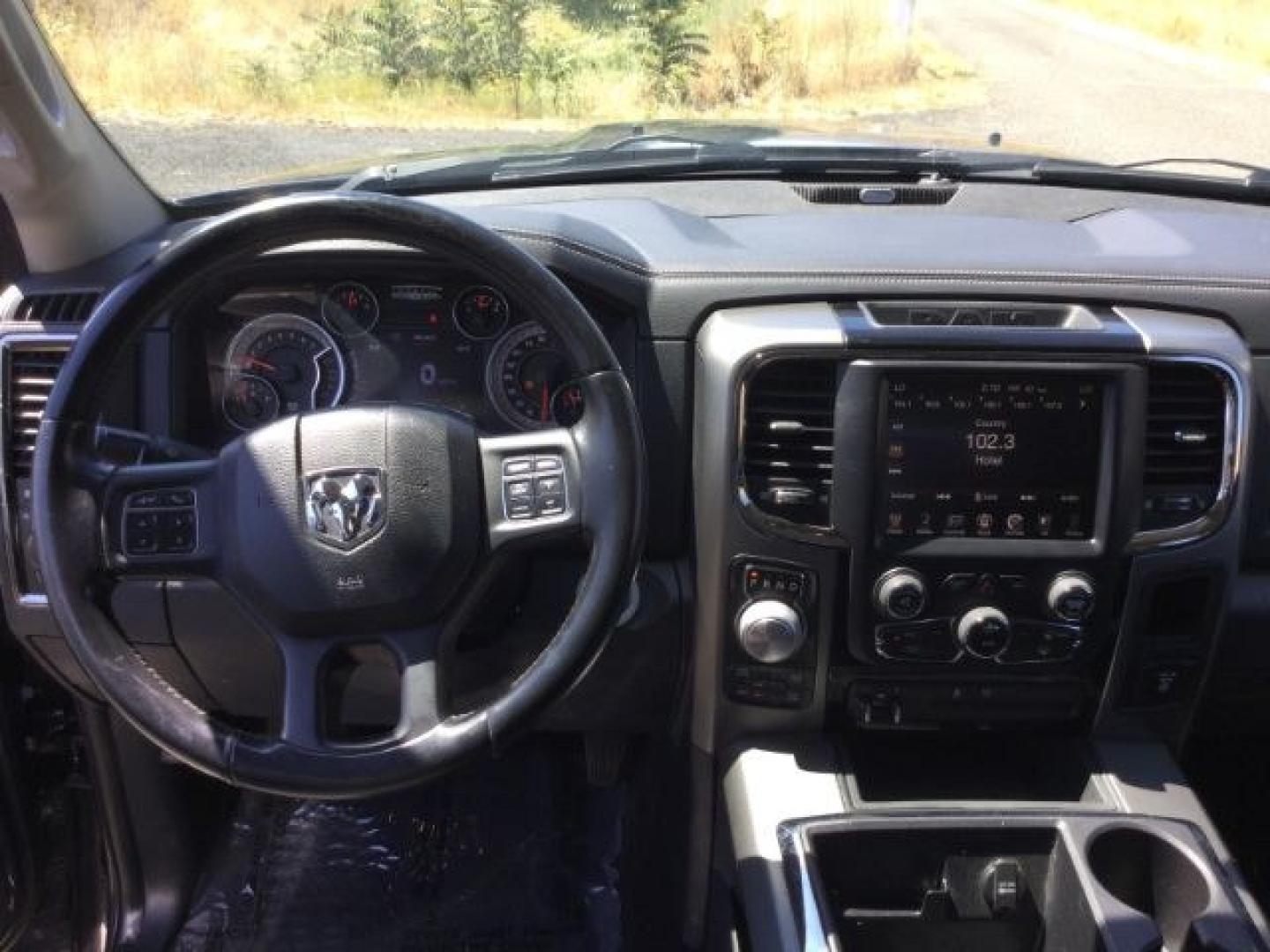 2015 Maximum Steel Metallic /Black Ram 1500 Sport (1C6RR7UT4FS) with an HEMI 5.7L V-8 variable valve control engine, 8 Speed Automatic transmission, located at 1801 Main Street, Lewiston, 83501, (208) 743-9371, 46.417065, -117.004799- Photo#5