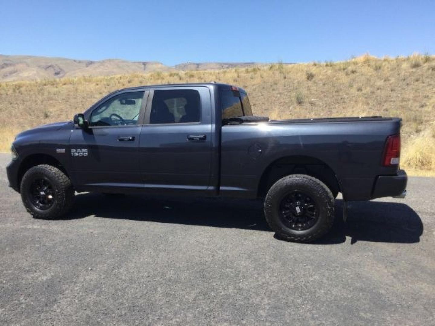 2015 Maximum Steel Metallic /Black Ram 1500 Sport (1C6RR7UT4FS) with an HEMI 5.7L V-8 variable valve control engine, 8 Speed Automatic transmission, located at 1801 Main Street, Lewiston, 83501, (208) 743-9371, 46.417065, -117.004799- Photo#8
