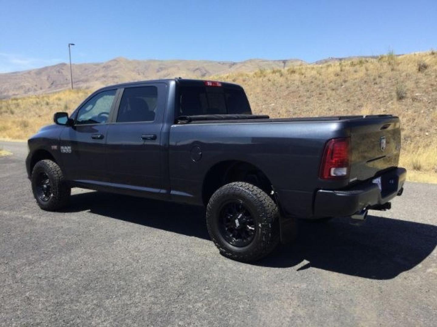 2015 Maximum Steel Metallic /Black Ram 1500 Sport (1C6RR7UT4FS) with an HEMI 5.7L V-8 variable valve control engine, 8 Speed Automatic transmission, located at 1801 Main Street, Lewiston, 83501, (208) 743-9371, 46.417065, -117.004799- Photo#9