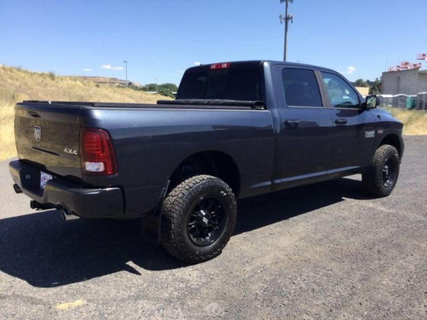 2015 Maximum Steel Metallic /Black Ram 1500 Sport (1C6RR7UT4FS) with an HEMI 5.7L V-8 variable valve control engine, 8 Speed Automatic transmission, located at 1801 Main Street, Lewiston, 83501, (208) 743-9371, 46.417065, -117.004799- Photo#20