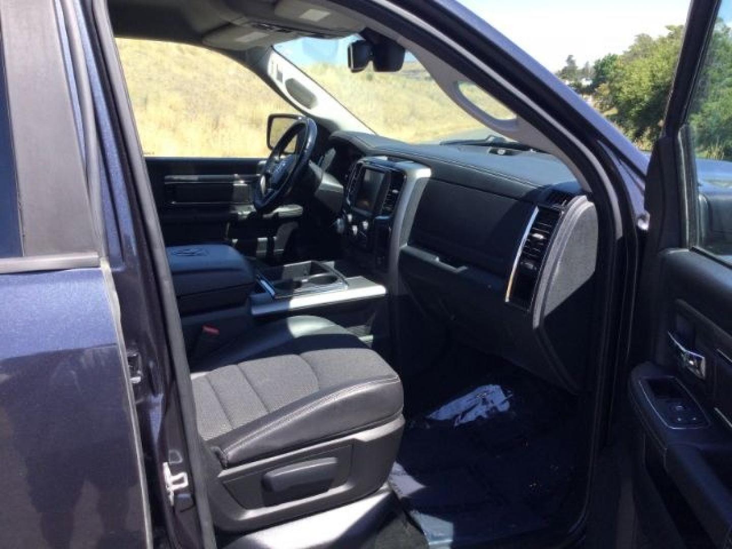 2015 Maximum Steel Metallic /Black Ram 1500 Sport (1C6RR7UT4FS) with an HEMI 5.7L V-8 variable valve control engine, 8 Speed Automatic transmission, located at 1801 Main Street, Lewiston, 83501, (208) 743-9371, 46.417065, -117.004799- Photo#23