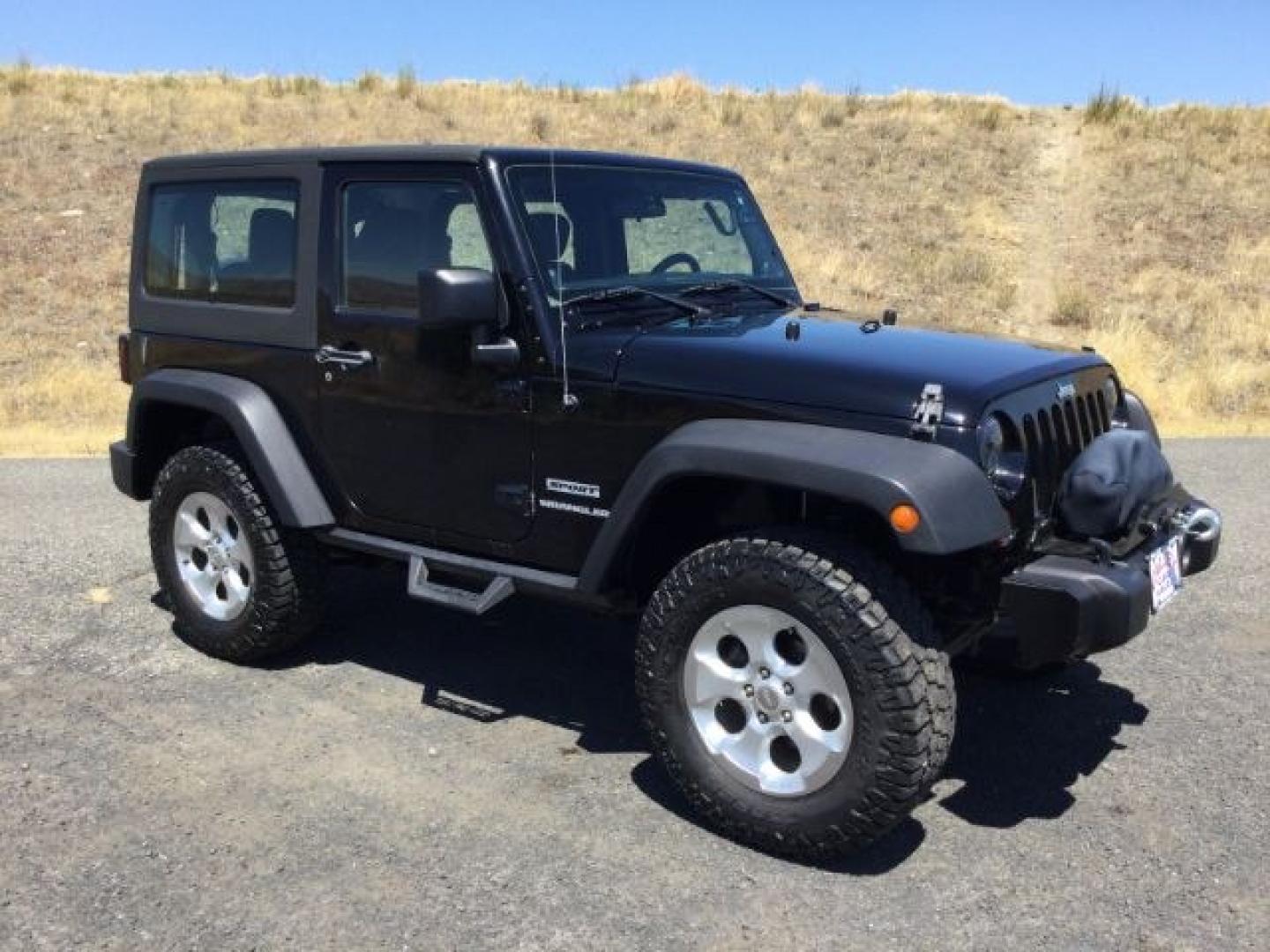 2011 Black with Black Hard Top /Black Cloth Interior Jeep Wrangler Sport 4WD (1J4AA2D14BL) with an 3.8L V6 OHV 12V engine, 4-Speed Automatic transmission, located at 1801 Main Street, Lewiston, 83501, (208) 743-9371, 46.417065, -117.004799- Photo#2