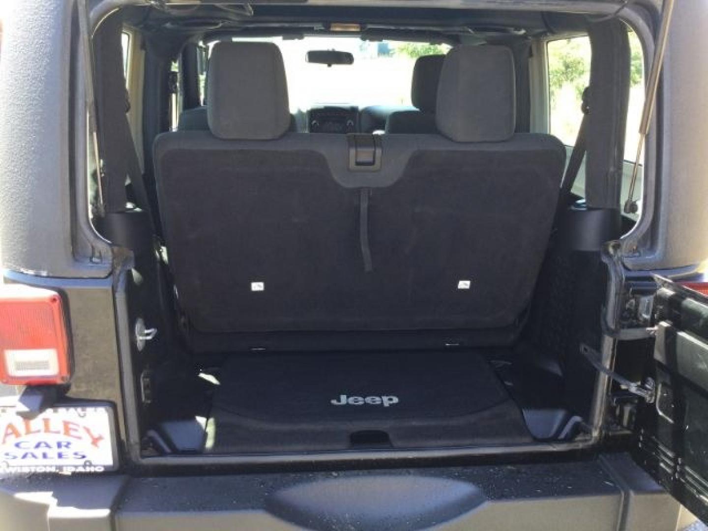 2011 Black with Black Hard Top /Black Cloth Interior Jeep Wrangler Sport 4WD (1J4AA2D14BL) with an 3.8L V6 OHV 12V engine, 4-Speed Automatic transmission, located at 1801 Main Street, Lewiston, 83501, (208) 743-9371, 46.417065, -117.004799- Photo#4