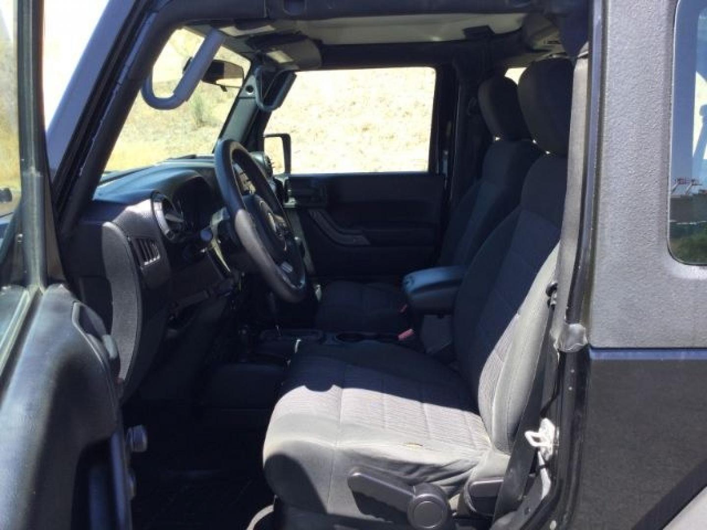 2011 Black with Black Hard Top /Black Cloth Interior Jeep Wrangler Sport 4WD (1J4AA2D14BL) with an 3.8L V6 OHV 12V engine, 4-Speed Automatic transmission, located at 1801 Main Street, Lewiston, 83501, (208) 743-9371, 46.417065, -117.004799- Photo#5