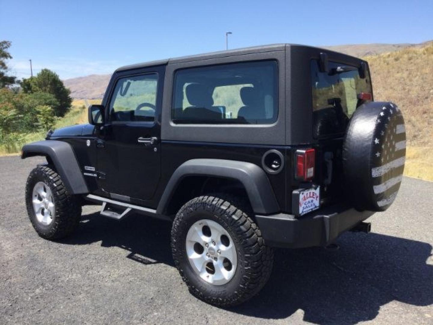 2011 Black with Black Hard Top /Black Cloth Interior Jeep Wrangler Sport 4WD (1J4AA2D14BL) with an 3.8L V6 OHV 12V engine, 4-Speed Automatic transmission, located at 1801 Main Street, Lewiston, 83501, (208) 743-9371, 46.417065, -117.004799- Photo#7