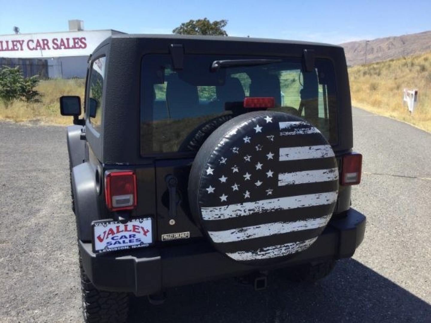 2011 Black with Black Hard Top /Black Cloth Interior Jeep Wrangler Sport 4WD (1J4AA2D14BL) with an 3.8L V6 OHV 12V engine, 4-Speed Automatic transmission, located at 1801 Main Street, Lewiston, 83501, (208) 743-9371, 46.417065, -117.004799- Photo#8