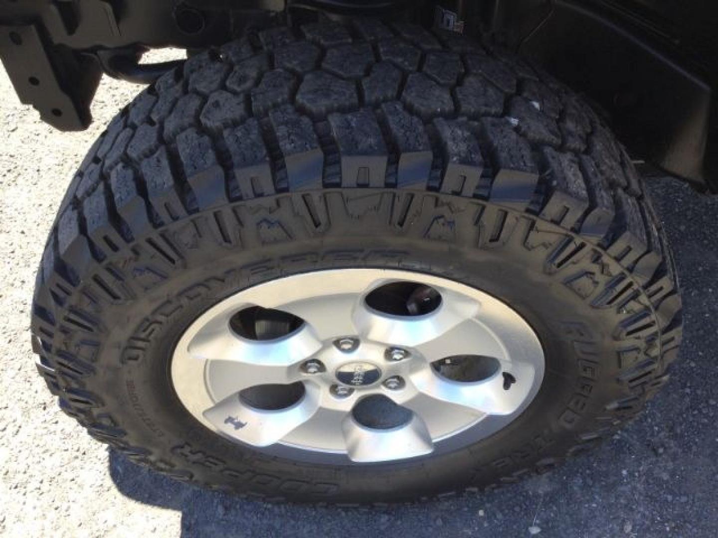 2011 Black with Black Hard Top /Black Cloth Interior Jeep Wrangler Sport 4WD (1J4AA2D14BL) with an 3.8L V6 OHV 12V engine, 4-Speed Automatic transmission, located at 1801 Main Street, Lewiston, 83501, (208) 743-9371, 46.417065, -117.004799- Photo#10