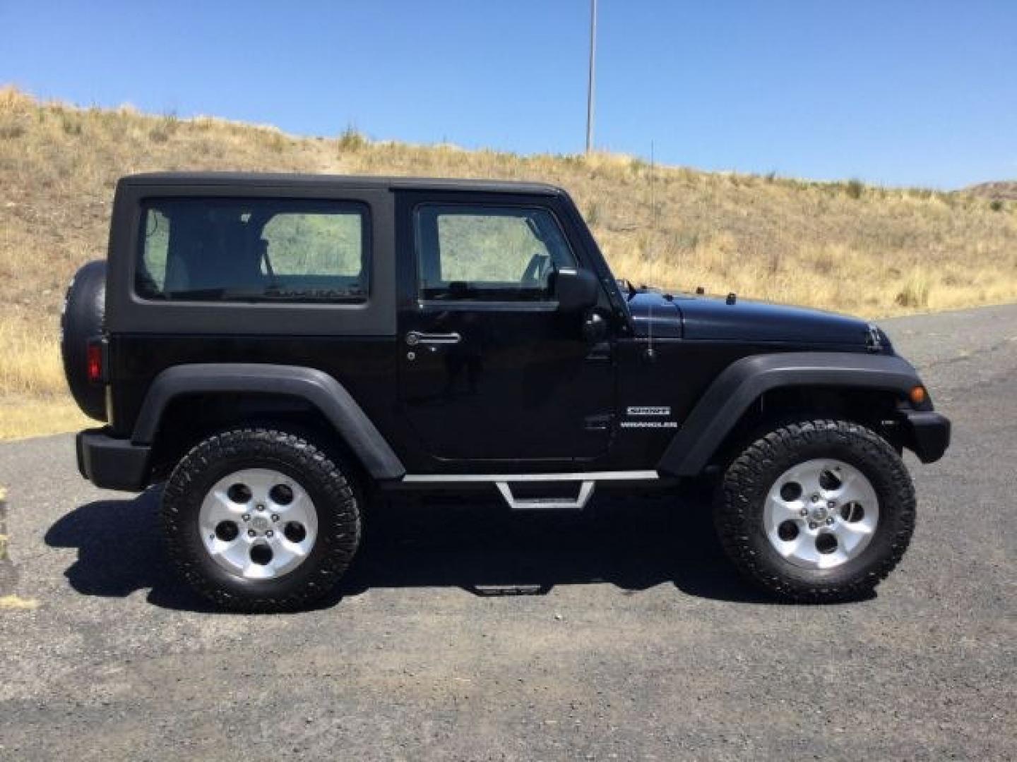 2011 Black with Black Hard Top /Black Cloth Interior Jeep Wrangler Sport 4WD (1J4AA2D14BL) with an 3.8L V6 OHV 12V engine, 4-Speed Automatic transmission, located at 1801 Main Street, Lewiston, 83501, (208) 743-9371, 46.417065, -117.004799- Photo#11