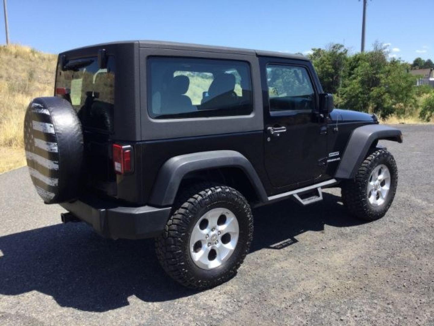 2011 Black with Black Hard Top /Black Cloth Interior Jeep Wrangler Sport 4WD (1J4AA2D14BL) with an 3.8L V6 OHV 12V engine, 4-Speed Automatic transmission, located at 1801 Main Street, Lewiston, 83501, (208) 743-9371, 46.417065, -117.004799- Photo#12