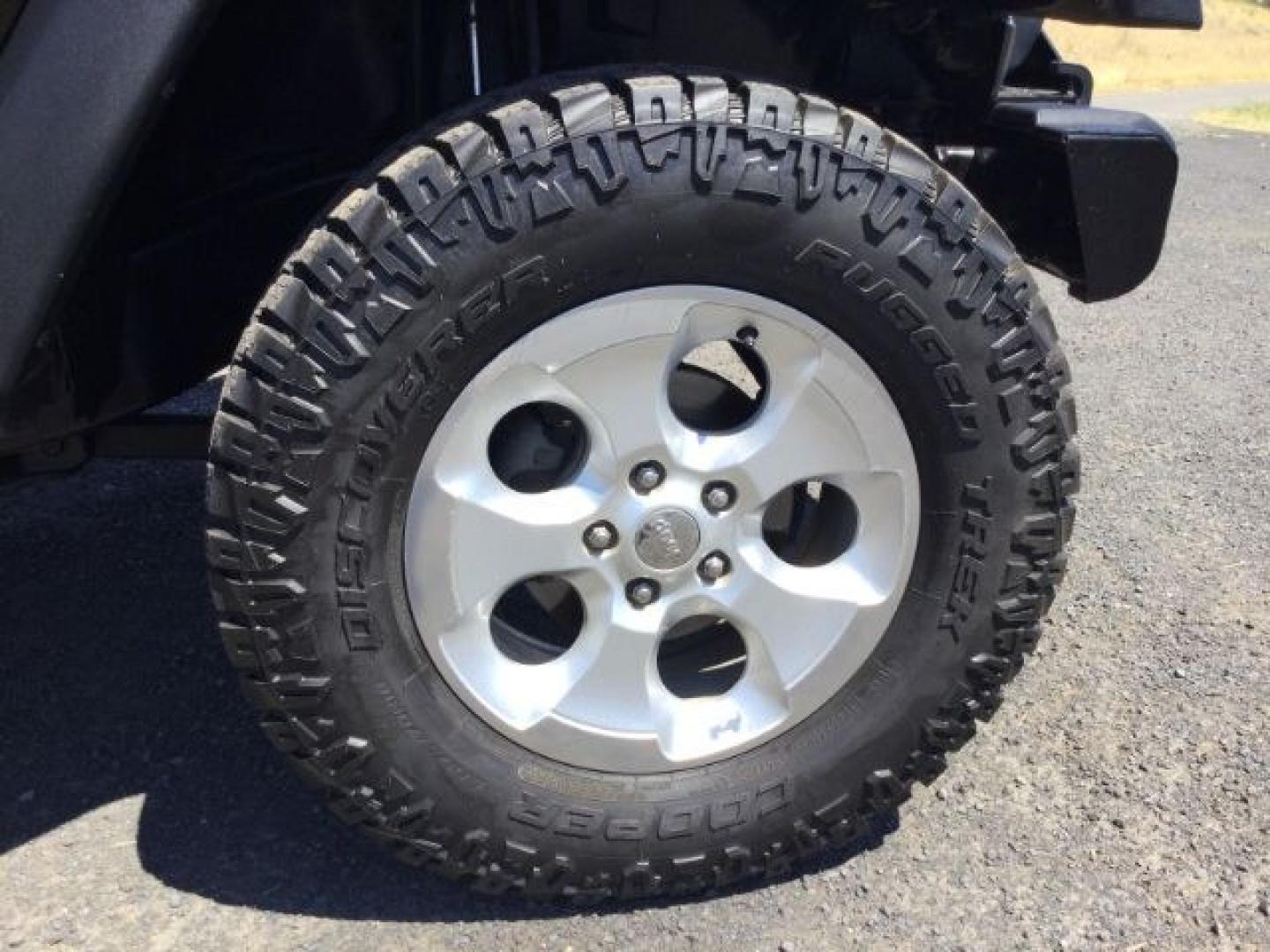 2011 Black with Black Hard Top /Black Cloth Interior Jeep Wrangler Sport 4WD (1J4AA2D14BL) with an 3.8L V6 OHV 12V engine, 4-Speed Automatic transmission, located at 1801 Main Street, Lewiston, 83501, (208) 743-9371, 46.417065, -117.004799- Photo#13
