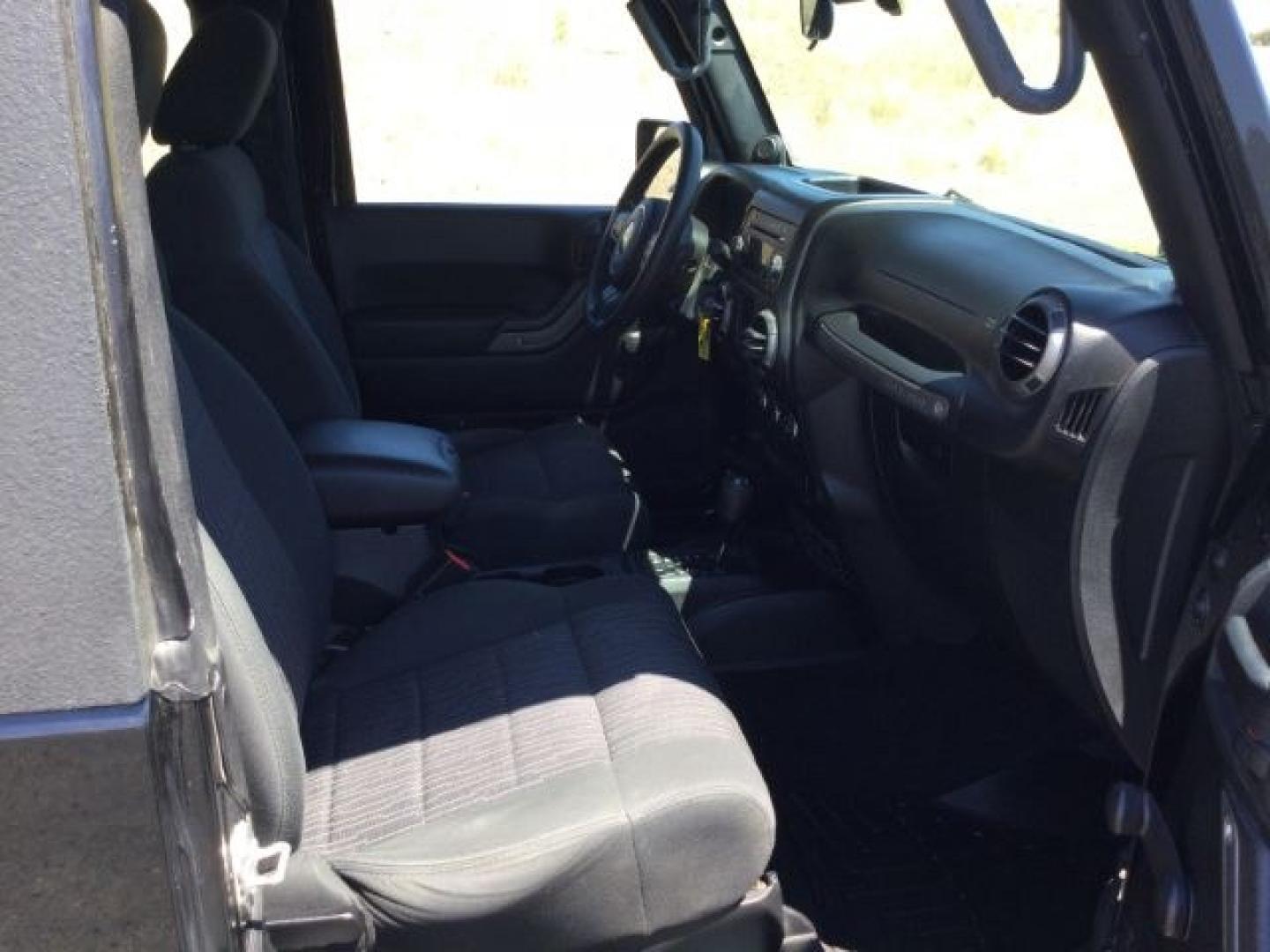 2011 Black with Black Hard Top /Black Cloth Interior Jeep Wrangler Sport 4WD (1J4AA2D14BL) with an 3.8L V6 OHV 12V engine, 4-Speed Automatic transmission, located at 1801 Main Street, Lewiston, 83501, (208) 743-9371, 46.417065, -117.004799- Photo#14