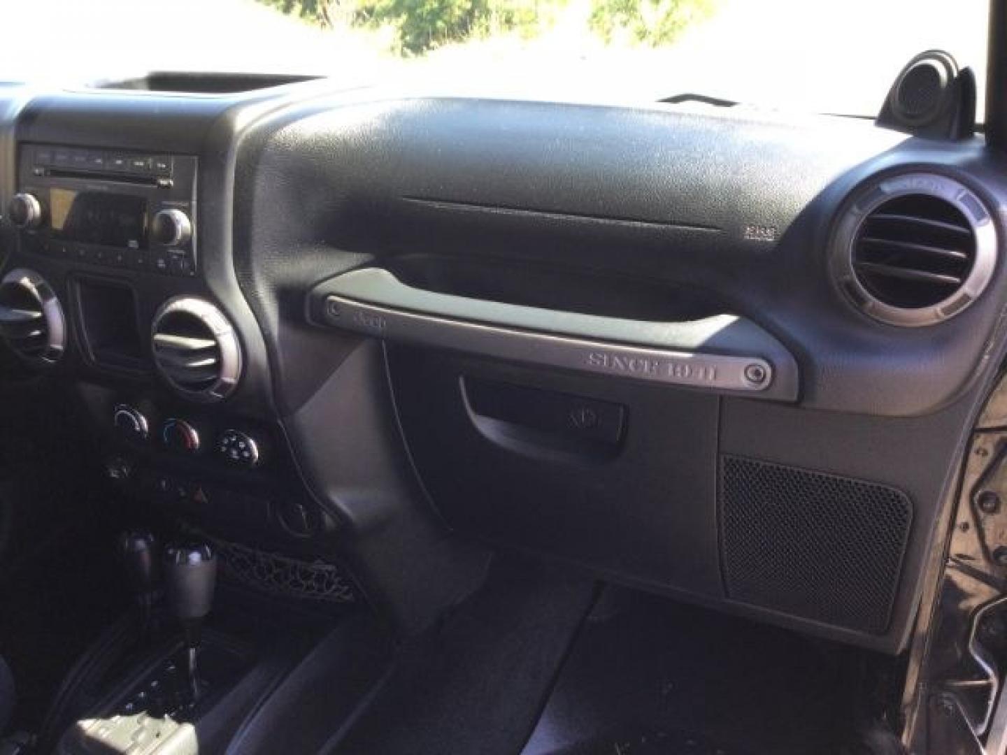 2011 Black with Black Hard Top /Black Cloth Interior Jeep Wrangler Sport 4WD (1J4AA2D14BL) with an 3.8L V6 OHV 12V engine, 4-Speed Automatic transmission, located at 1801 Main Street, Lewiston, 83501, (208) 743-9371, 46.417065, -117.004799- Photo#16