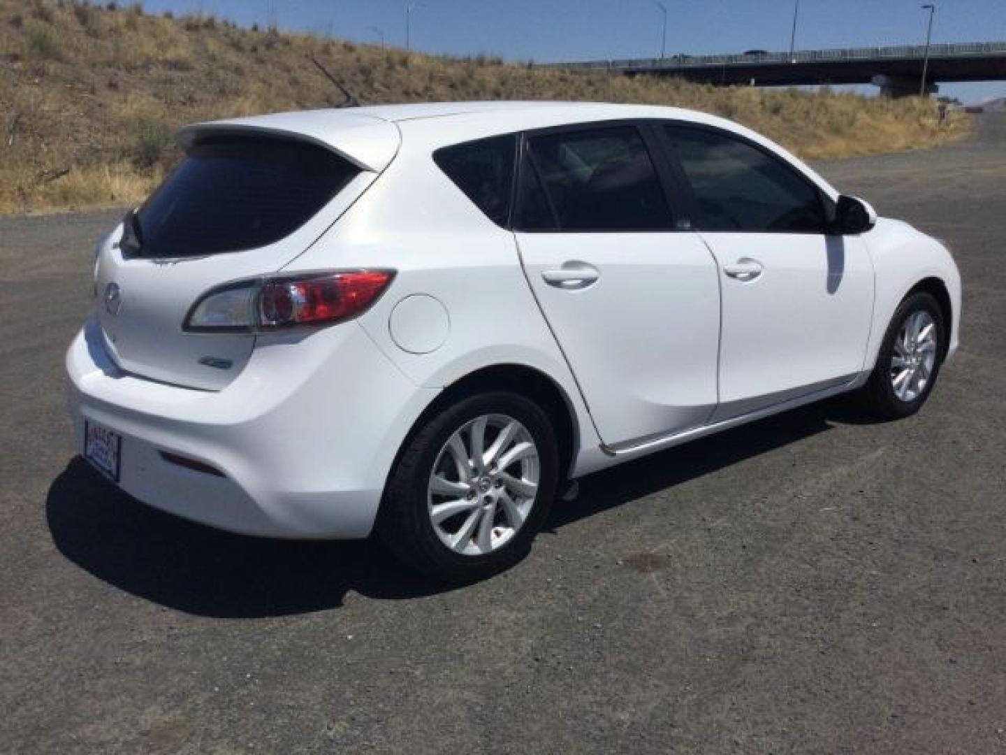 2012 Crystal White Pearl Mica /Black Mazda Mazda3 Hatchback i Touring (JM1BL1L72C1) with an SKYACTIV-G 2L I-4 gasoline direct injection engine, 6-Speed Automatic transmission, located at 1801 Main Street, Lewiston, 83501, (208) 743-9371, 46.417065, -117.004799- Photo#2