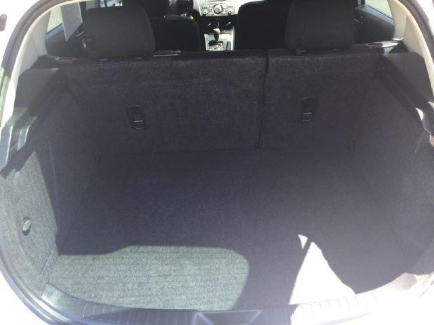 2012 Crystal White Pearl Mica /Black Mazda Mazda3 Hatchback i Touring (JM1BL1L72C1) with an SKYACTIV-G 2L I-4 gasoline direct injection engine, 6-Speed Automatic transmission, located at 1801 Main Street, Lewiston, 83501, (208) 743-9371, 46.417065, -117.004799- Photo#9
