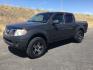 2014 Night Armor /Steel Nissan Frontier SV (1N6AD0EV9EN) with an VQ 4L V-6 DOHC engine, 5-Speed Automatic transmission, located at 1801 Main Street, Lewiston, 83501, (208) 743-9371, 46.417065, -117.004799- Photo#1