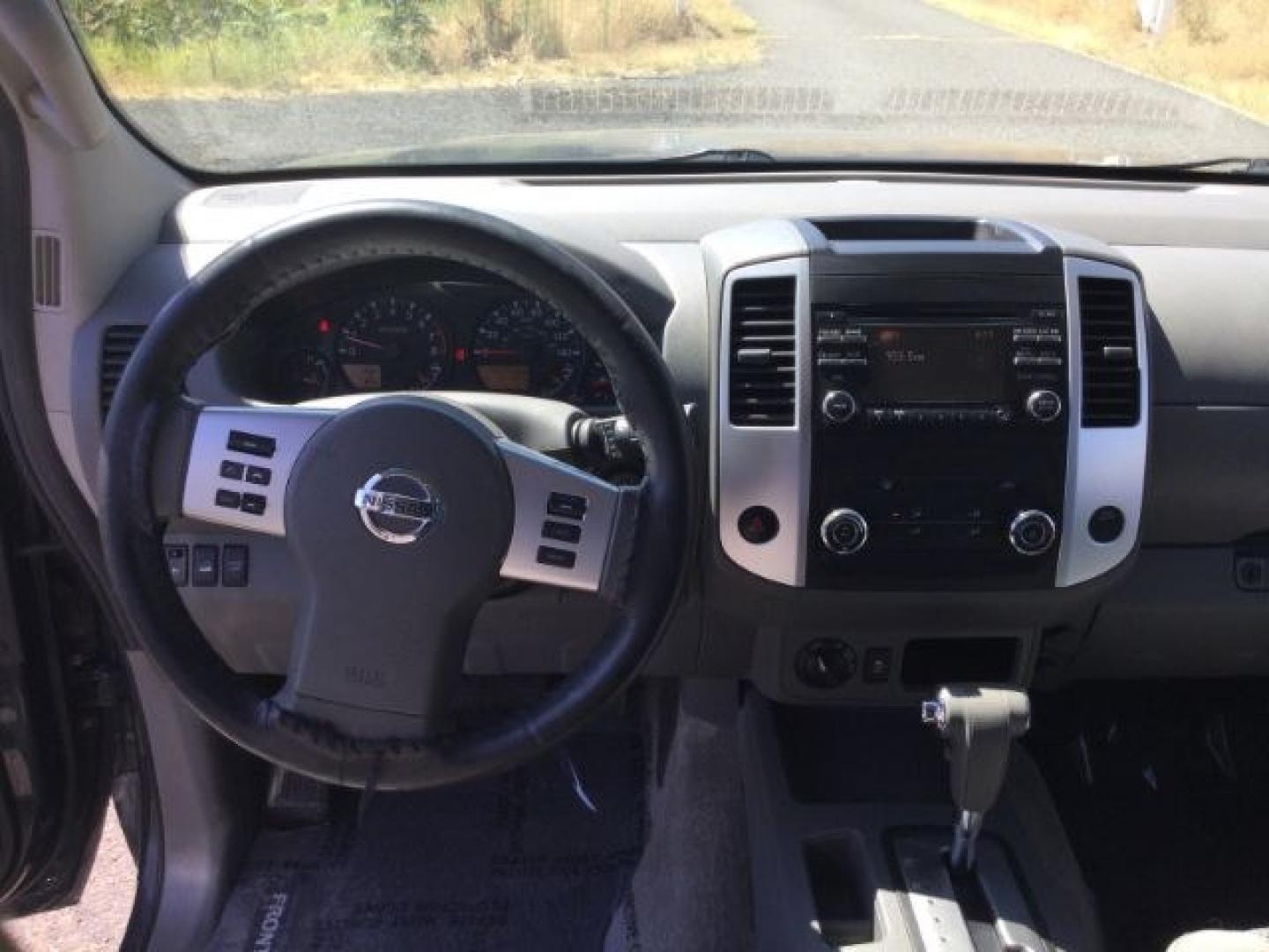 2014 Night Armor /Steel Nissan Frontier SV (1N6AD0EV9EN) with an VQ 4L V-6 DOHC engine, 5-Speed Automatic transmission, located at 1801 Main Street, Lewiston, 83501, (208) 743-9371, 46.417065, -117.004799- Photo#4