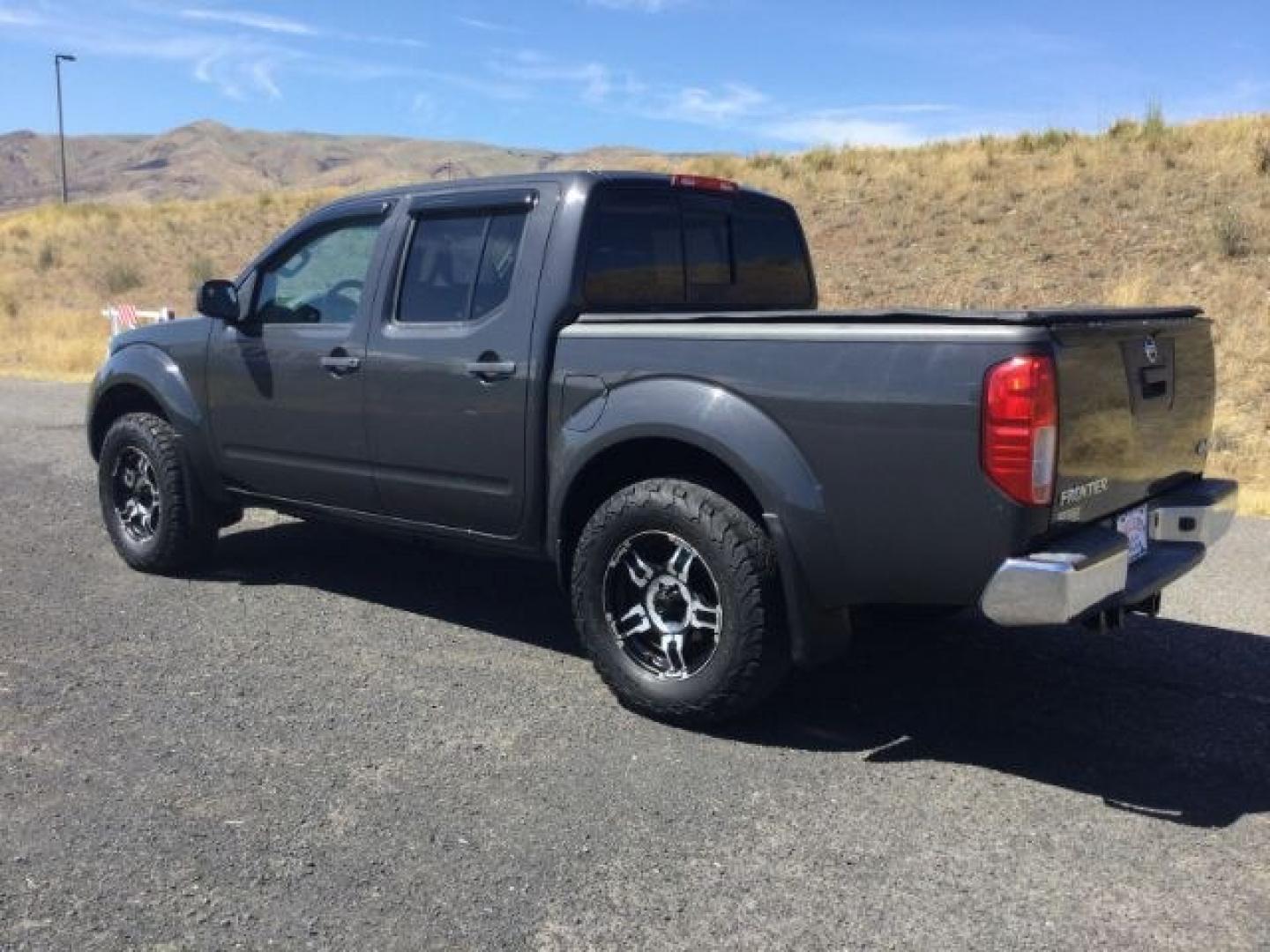 2014 Night Armor /Steel Nissan Frontier SV (1N6AD0EV9EN) with an VQ 4L V-6 DOHC engine, 5-Speed Automatic transmission, located at 1801 Main Street, Lewiston, 83501, (208) 743-9371, 46.417065, -117.004799- Photo#6