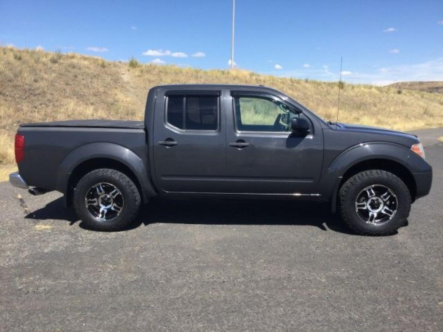 2014 Night Armor /Steel Nissan Frontier SV (1N6AD0EV9EN) with an VQ 4L V-6 DOHC engine, 5-Speed Automatic transmission, located at 1801 Main Street, Lewiston, 83501, (208) 743-9371, 46.417065, -117.004799- Photo#16