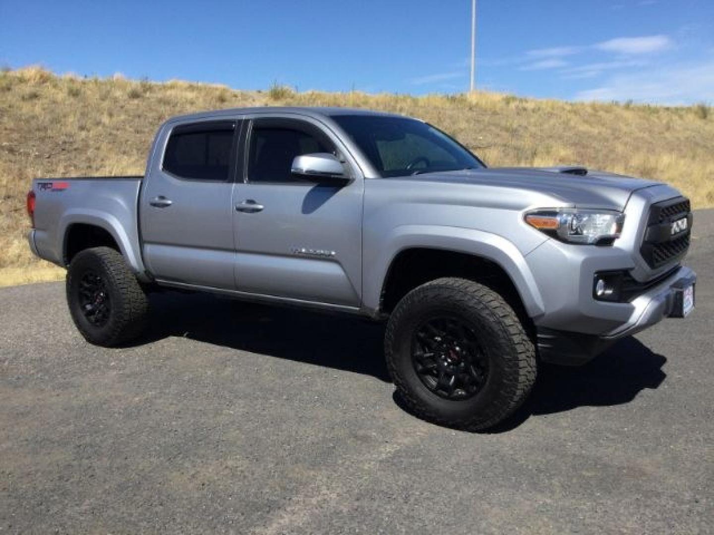2016 Silver Sky Metallic /Graphite w/Gun Metal Toyota Tacoma TRD Sport Crew Cab 5.5ft bed (3TMCZ5AN4GM) with an 3.5L V-6 port/direct injection engine, 6-Speed Automatic transmission, located at 1801 Main Street, Lewiston, 83501, (208) 743-9371, 46.417065, -117.004799- Photo#0