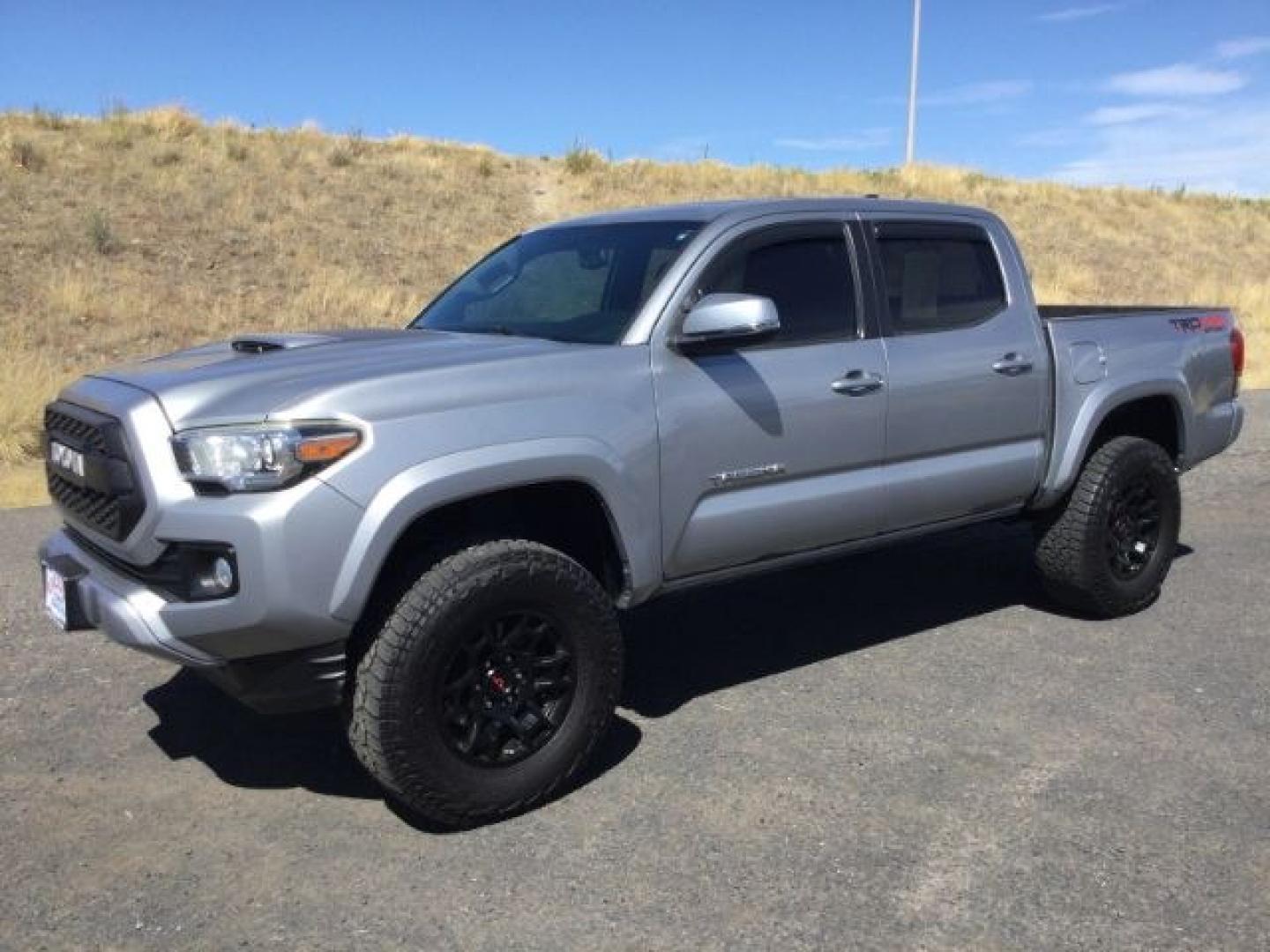 2016 Silver Sky Metallic /Graphite w/Gun Metal Toyota Tacoma TRD Sport Crew Cab 5.5ft bed (3TMCZ5AN4GM) with an 3.5L V-6 port/direct injection engine, 6-Speed Automatic transmission, located at 1801 Main Street, Lewiston, 83501, (208) 743-9371, 46.417065, -117.004799- Photo#1