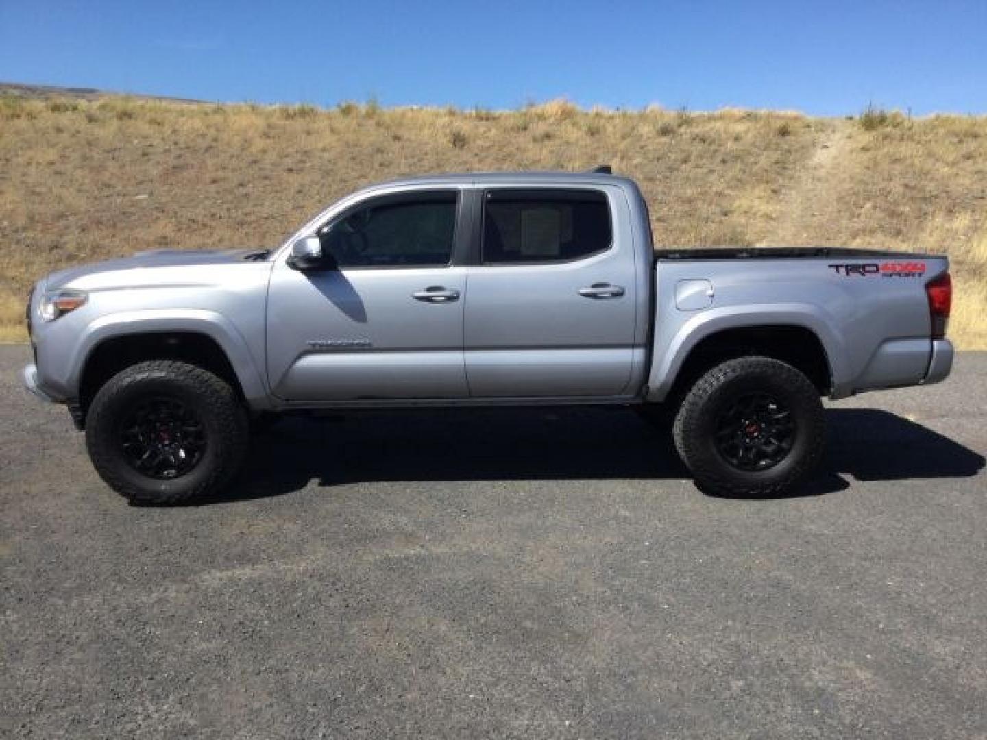 2016 Silver Sky Metallic /Graphite w/Gun Metal Toyota Tacoma TRD Sport Crew Cab 5.5ft bed (3TMCZ5AN4GM) with an 3.5L V-6 port/direct injection engine, 6-Speed Automatic transmission, located at 1801 Main Street, Lewiston, 83501, (208) 743-9371, 46.417065, -117.004799- Photo#2