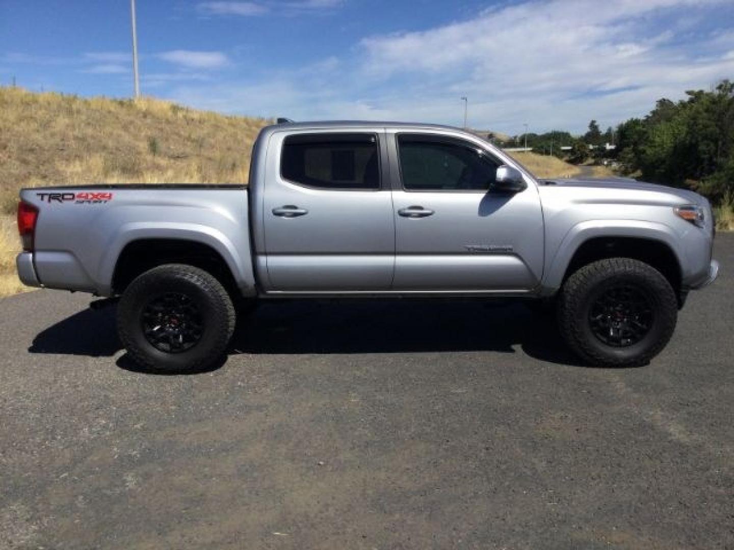 2016 Silver Sky Metallic /Graphite w/Gun Metal Toyota Tacoma TRD Sport Crew Cab 5.5ft bed (3TMCZ5AN4GM) with an 3.5L V-6 port/direct injection engine, 6-Speed Automatic transmission, located at 1801 Main Street, Lewiston, 83501, (208) 743-9371, 46.417065, -117.004799- Photo#3