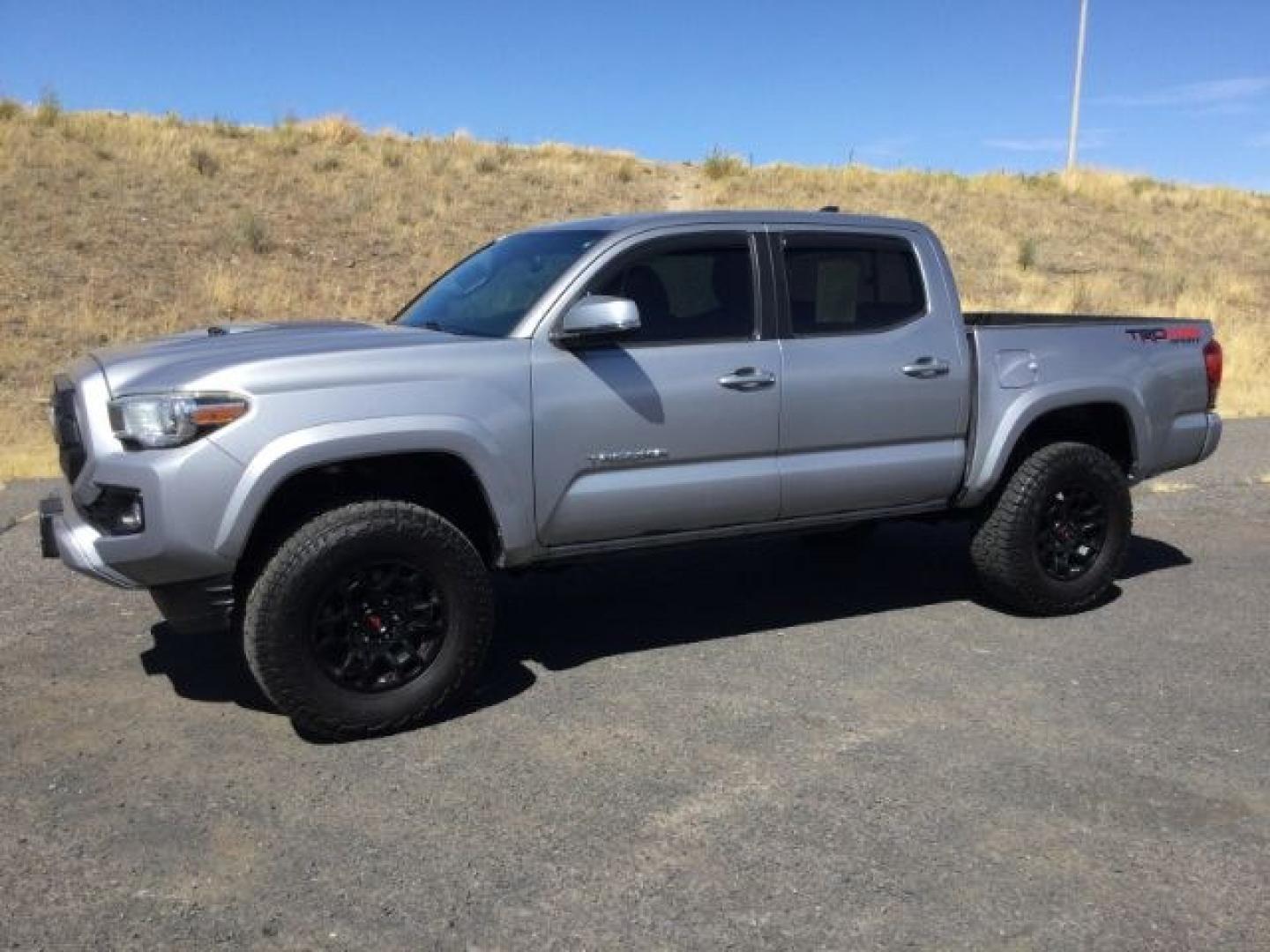 2016 Silver Sky Metallic /Graphite w/Gun Metal Toyota Tacoma TRD Sport Crew Cab 5.5ft bed (3TMCZ5AN4GM) with an 3.5L V-6 port/direct injection engine, 6-Speed Automatic transmission, located at 1801 Main Street, Lewiston, 83501, (208) 743-9371, 46.417065, -117.004799- Photo#9