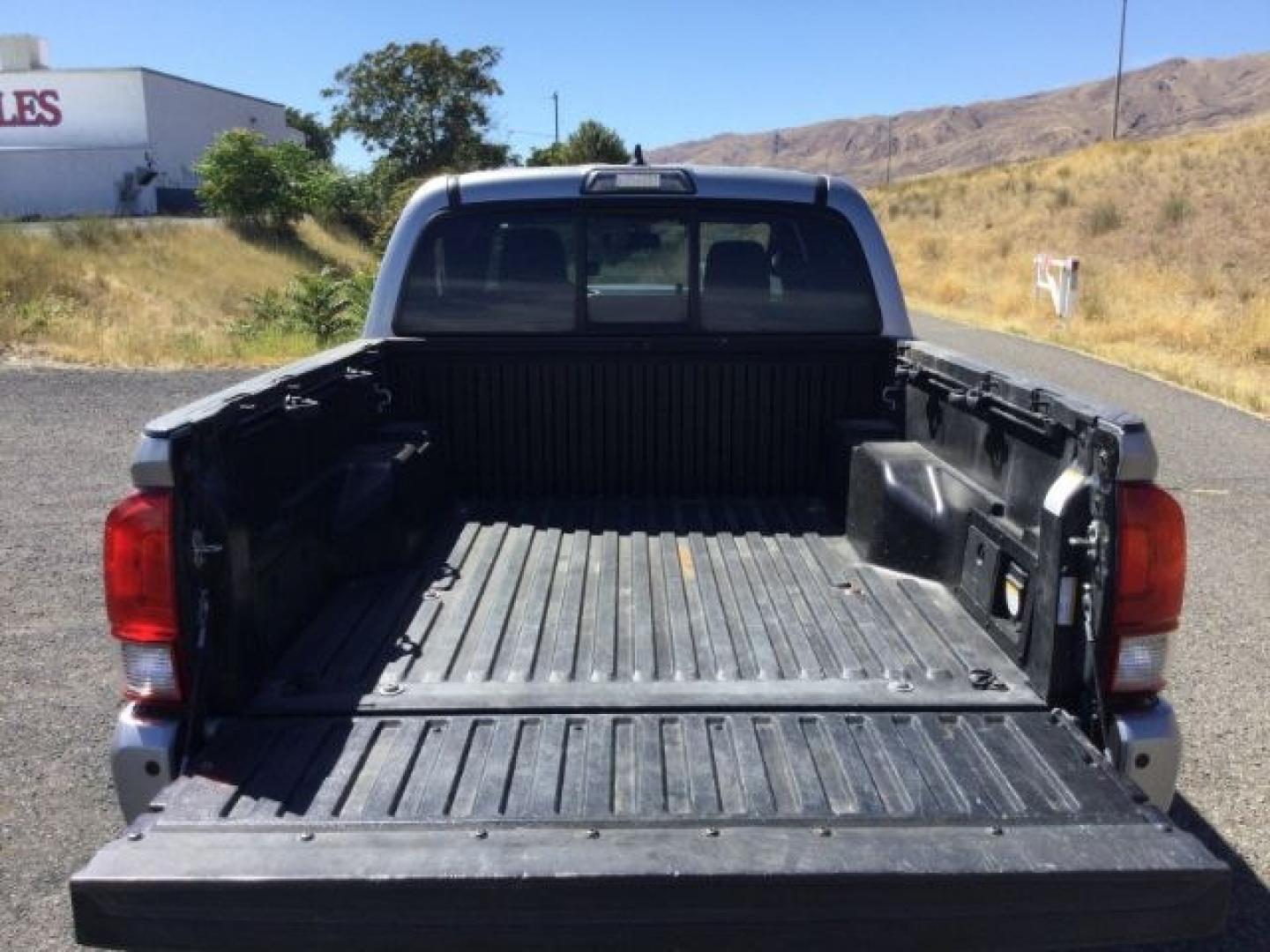 2016 Silver Sky Metallic /Graphite w/Gun Metal Toyota Tacoma TRD Sport Crew Cab 5.5ft bed (3TMCZ5AN4GM) with an 3.5L V-6 port/direct injection engine, 6-Speed Automatic transmission, located at 1801 Main Street, Lewiston, 83501, (208) 743-9371, 46.417065, -117.004799- Photo#12