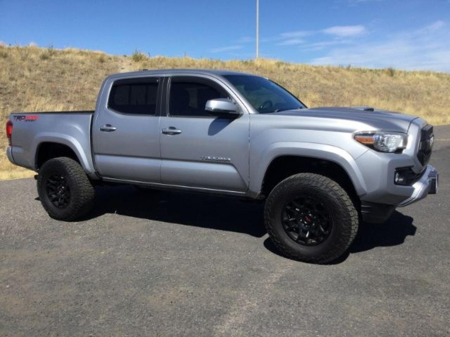 2016 Silver Sky Metallic /Graphite w/Gun Metal Toyota Tacoma TRD Sport Crew Cab 5.5ft bed (3TMCZ5AN4GM) with an 3.5L V-6 port/direct injection engine, 6-Speed Automatic transmission, located at 1801 Main Street, Lewiston, 83501, (208) 743-9371, 46.417065, -117.004799- Photo#21