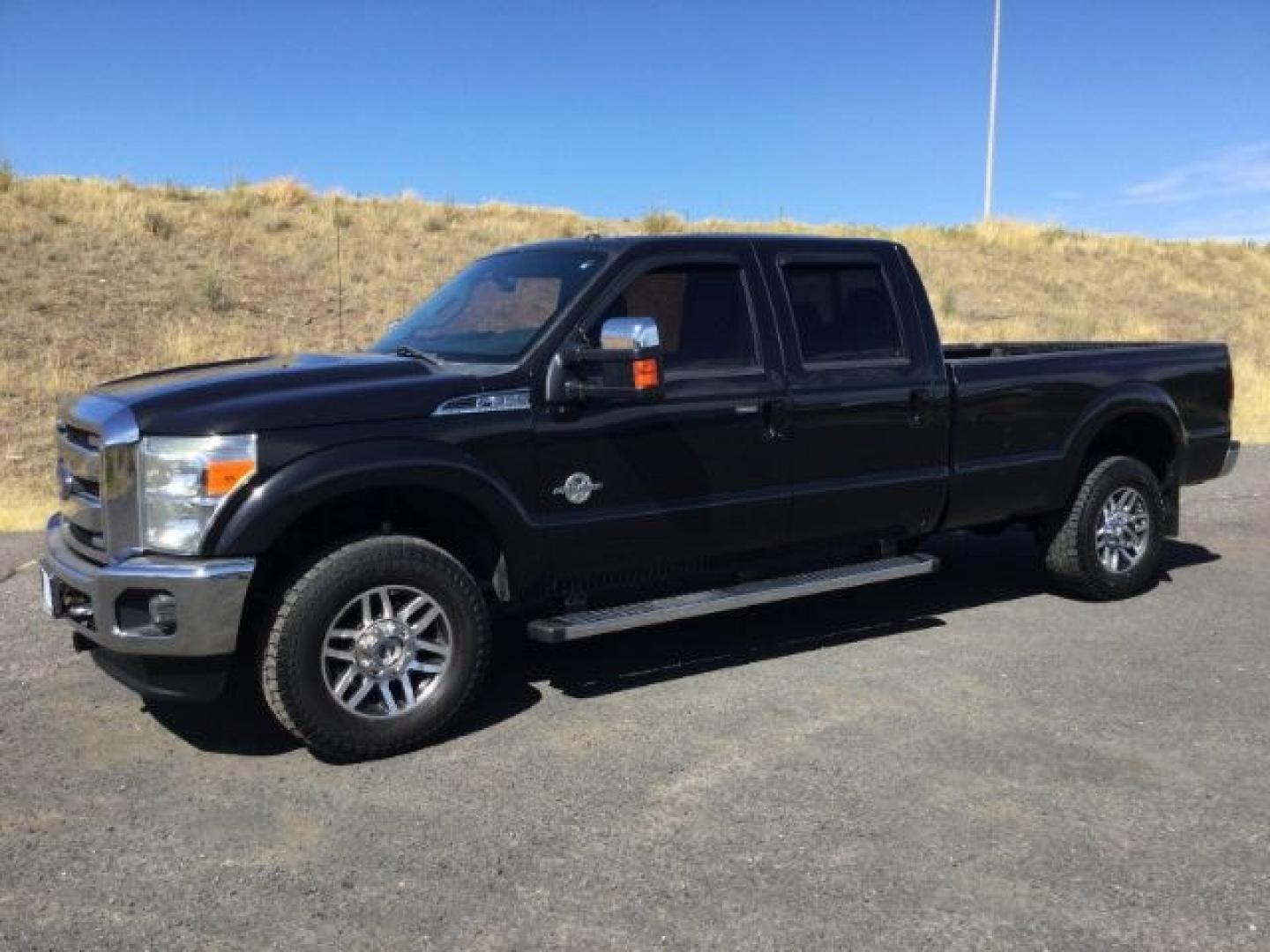 2014 Tuxedo Black Metallic /Black Ford F-350 LARIAT (1FT8W3BTXEE) with an Powerstroke 6.7L V-8 diesel direct injection engine, 6-Speed Automatic transmission, located at 1801 Main Street, Lewiston, 83501, (208) 743-9371, 46.417065, -117.004799- Photo#1
