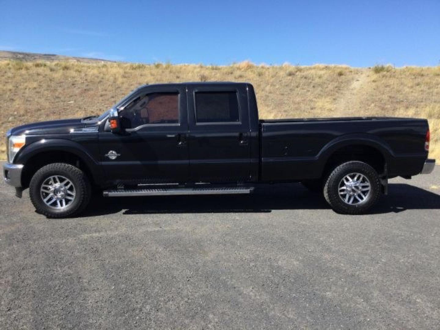 2014 Tuxedo Black Metallic /Black Ford F-350 LARIAT (1FT8W3BTXEE) with an Powerstroke 6.7L V-8 diesel direct injection engine, 6-Speed Automatic transmission, located at 1801 Main Street, Lewiston, 83501, (208) 743-9371, 46.417065, -117.004799- Photo#2
