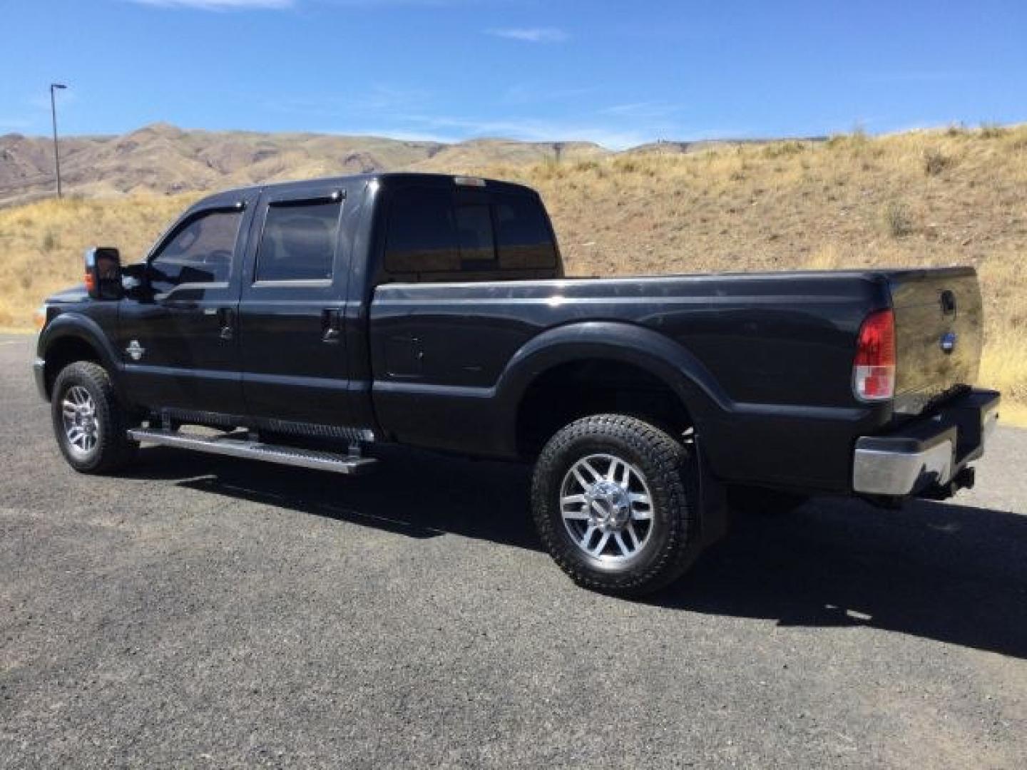 2014 Tuxedo Black Metallic /Black Ford F-350 LARIAT (1FT8W3BTXEE) with an Powerstroke 6.7L V-8 diesel direct injection engine, 6-Speed Automatic transmission, located at 1801 Main Street, Lewiston, 83501, (208) 743-9371, 46.417065, -117.004799- Photo#9