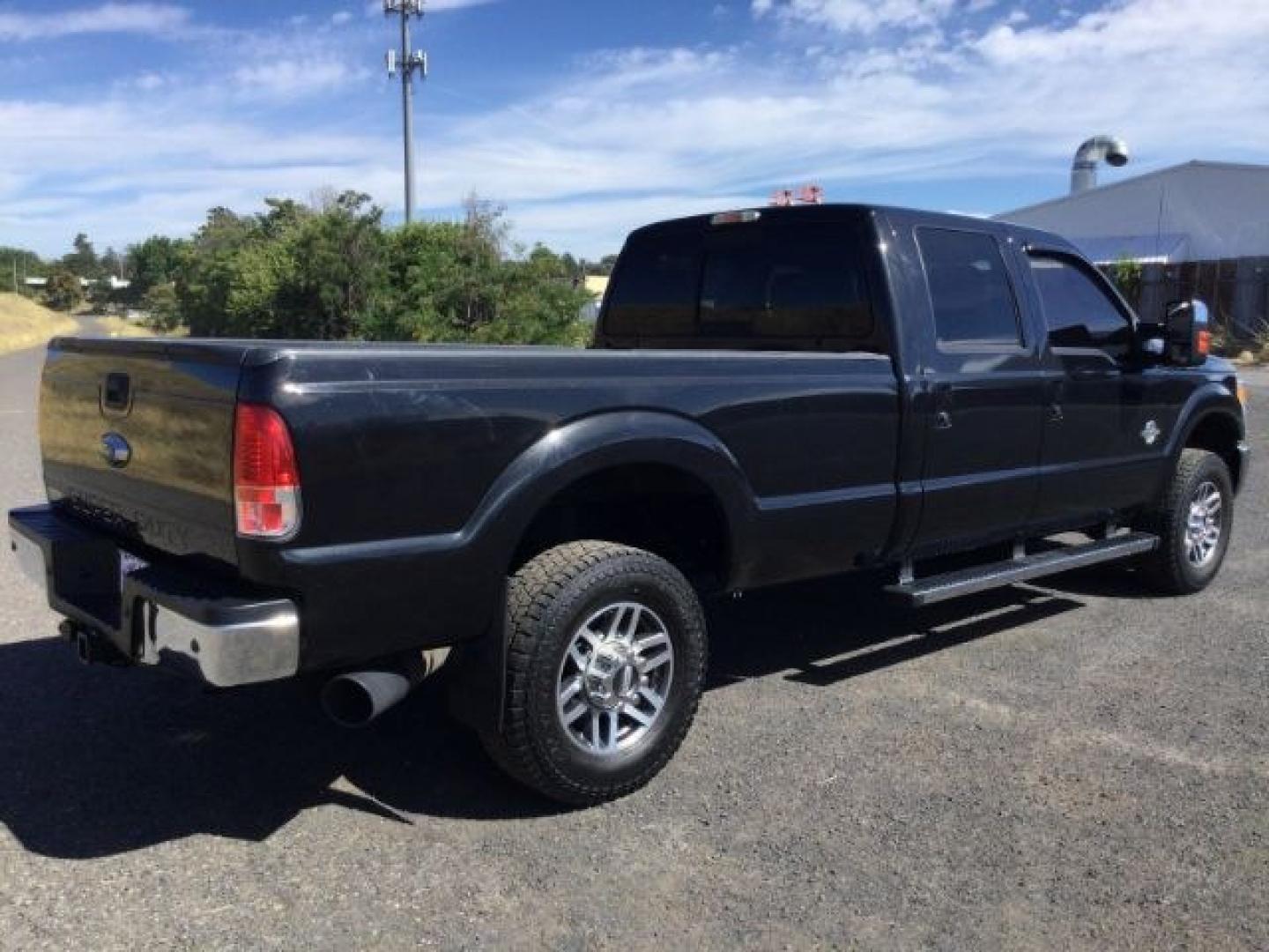 2014 Tuxedo Black Metallic /Black Ford F-350 LARIAT (1FT8W3BTXEE) with an Powerstroke 6.7L V-8 diesel direct injection engine, 6-Speed Automatic transmission, located at 1801 Main Street, Lewiston, 83501, (208) 743-9371, 46.417065, -117.004799- Photo#15