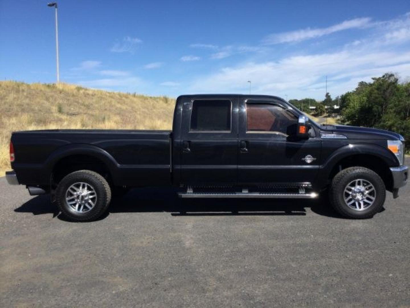 2014 Tuxedo Black Metallic /Black Ford F-350 LARIAT (1FT8W3BTXEE) with an Powerstroke 6.7L V-8 diesel direct injection engine, 6-Speed Automatic transmission, located at 1801 Main Street, Lewiston, 83501, (208) 743-9371, 46.417065, -117.004799- Photo#16