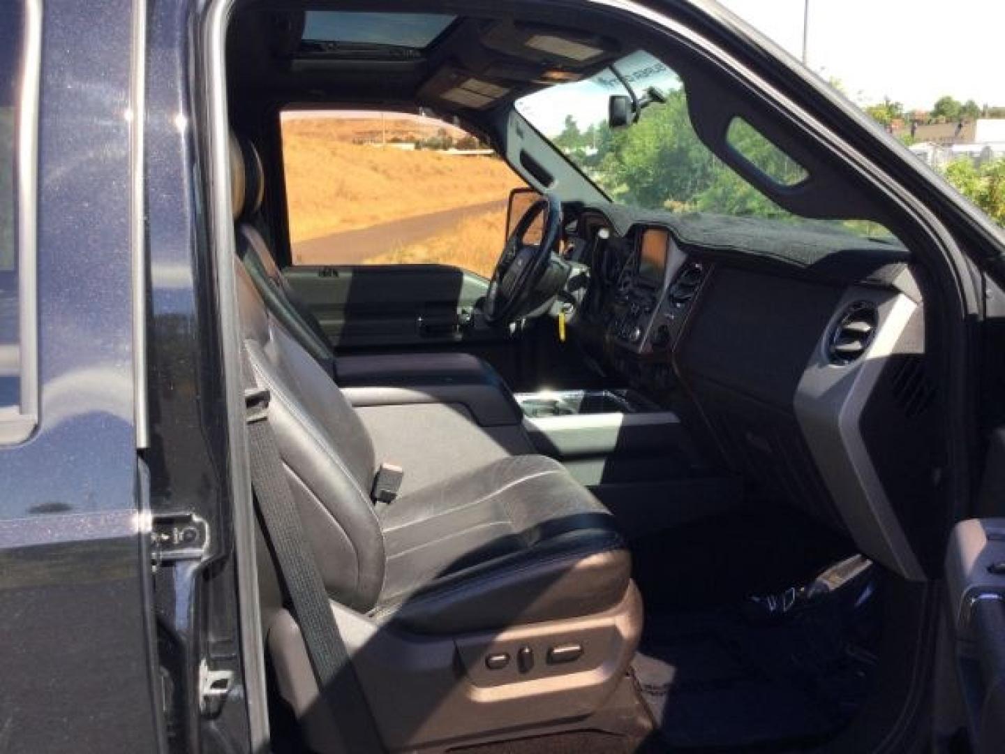 2014 Tuxedo Black Metallic /Black Ford F-350 LARIAT (1FT8W3BTXEE) with an Powerstroke 6.7L V-8 diesel direct injection engine, 6-Speed Automatic transmission, located at 1801 Main Street, Lewiston, 83501, (208) 743-9371, 46.417065, -117.004799- Photo#24