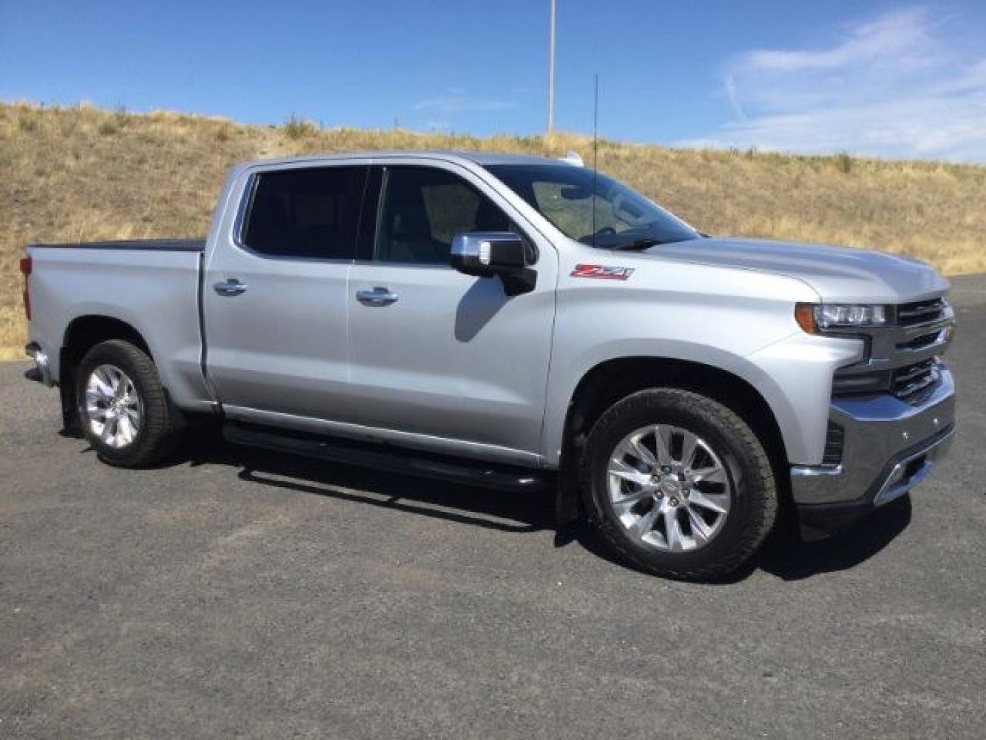 2020 Silver Ice Metallic /Jet Black Chevrolet Silverado 1500 LTZ (1GCUYGED0LZ) with an EcoTec3 5.3L V-8 gasoline direct injection engine, 8-Speed Automatic transmission, located at 1801 Main Street, Lewiston, 83501, (208) 743-9371, 46.417065, -117.004799- Photo#0