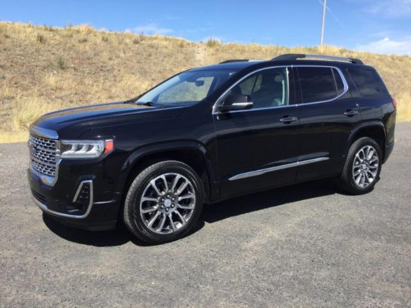 2021 Ebony Twilight Metallic /Jet Black GMC Acadia Denali (1GKKNXLSXMZ) with an 3.6L V-6 gasoline direct injection engine, 9 Speed Automatic transmission, located at 1801 Main Street, Lewiston, 83501, (208) 743-9371, 46.417065, -117.004799- Photo#1