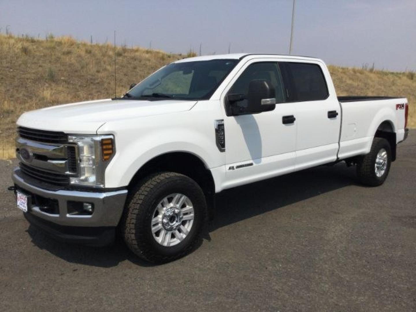 2019 Oxford White /Medium Earth Gray Ford F-350 XLT (1FT8W3BT7KE) with an Powerstroke 6.7L V-8 diesel direct injection engine, 6-Speed Automatic transmission, located at 1801 Main Street, Lewiston, 83501, (208) 743-9371, 46.417065, -117.004799- Photo#0