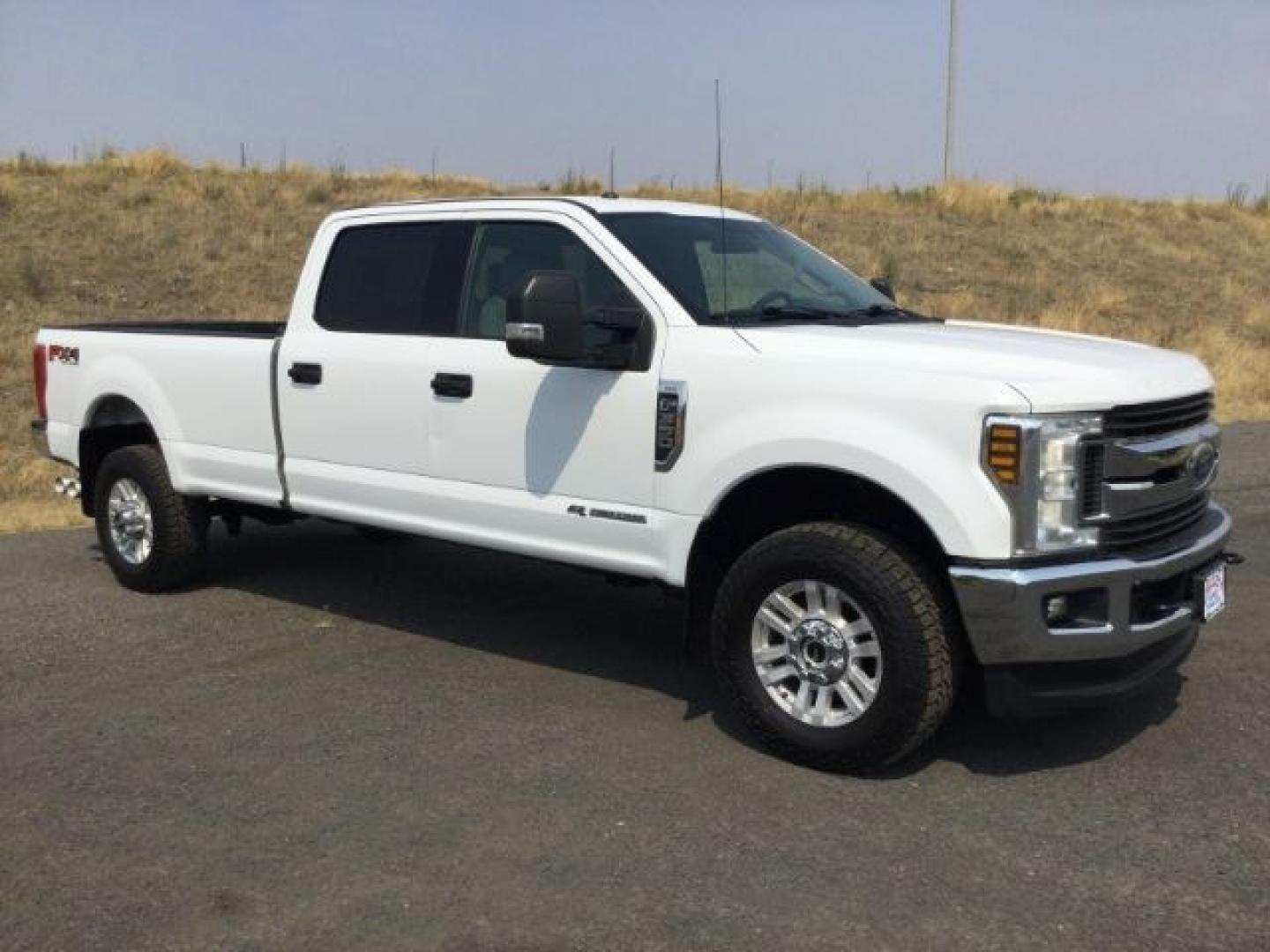 2019 Oxford White /Medium Earth Gray Ford F-350 XLT (1FT8W3BT7KE) with an Powerstroke 6.7L V-8 diesel direct injection engine, 6-Speed Automatic transmission, located at 1801 Main Street, Lewiston, 83501, (208) 743-9371, 46.417065, -117.004799- Photo#1