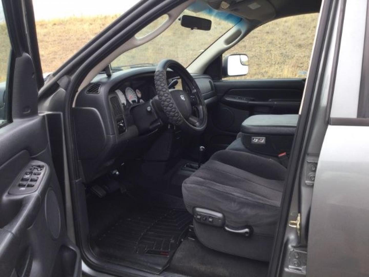 2005 Mineral Gray Metallic Clearcoat /Dark Slate Gray Dodge Ram 2500 SLT Quad Cab (3D7KS28C25G) with an Cummins 5.9L I-6 diesel direct injection engine, 4 speed automatic transmission, located at 1801 Main Street, Lewiston, 83501, (208) 743-9371, 46.417065, -117.004799- Photo#4