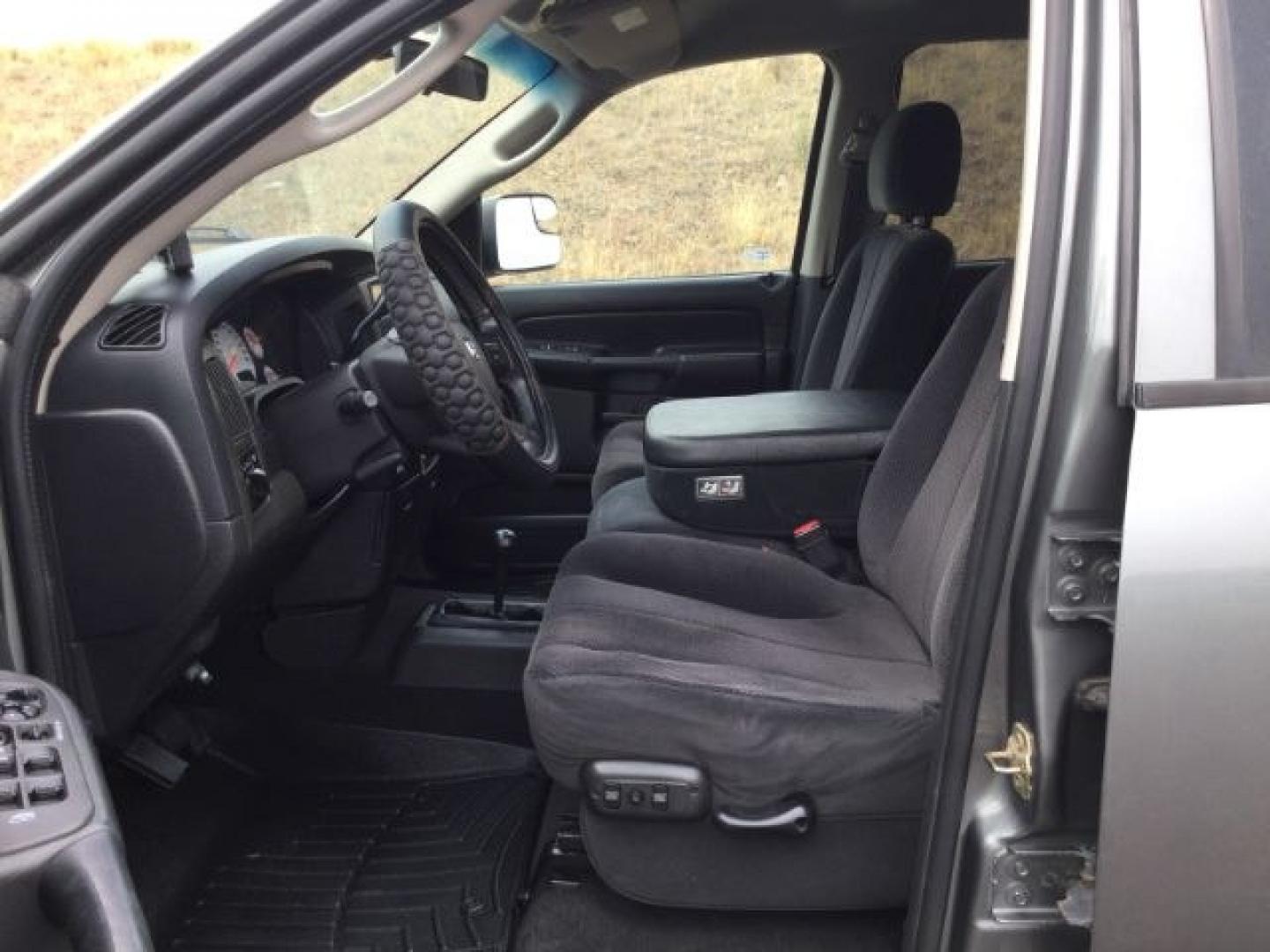 2005 Mineral Gray Metallic Clearcoat /Dark Slate Gray Dodge Ram 2500 SLT Quad Cab (3D7KS28C25G) with an Cummins 5.9L I-6 diesel direct injection engine, 4 speed automatic transmission, located at 1801 Main Street, Lewiston, 83501, (208) 743-9371, 46.417065, -117.004799- Photo#5